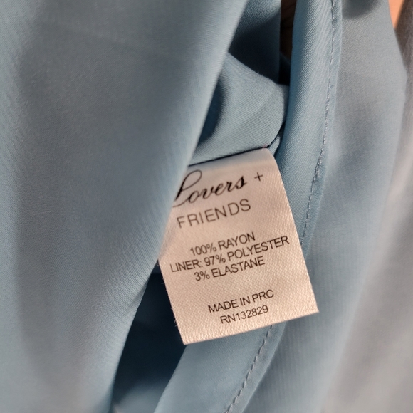 Lovers + Friends Boulevard Lace Up Split Flutter Sleeve Ruffle Peplum Flowy Top - Picture 12 of 12